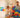 Parent and two kids building a tall structure with colorful jumbo building blocks on the floor, showing hands-on play that boosts focus, imagination, and brain development.