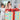 Two children and a woman excitedly unwrapping a big birthday gift with colorful wrapping and bows. 