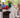 Family having fun with white jumbo building blocks.