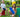 Two children playing happily outdoors with large building blocks, showcasing creativity and teamwork in a fun, playful setting.
