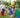 A boy and a girl happily enjoying playing outdoors with colorful jumbo building blocks from Biggo Blocks